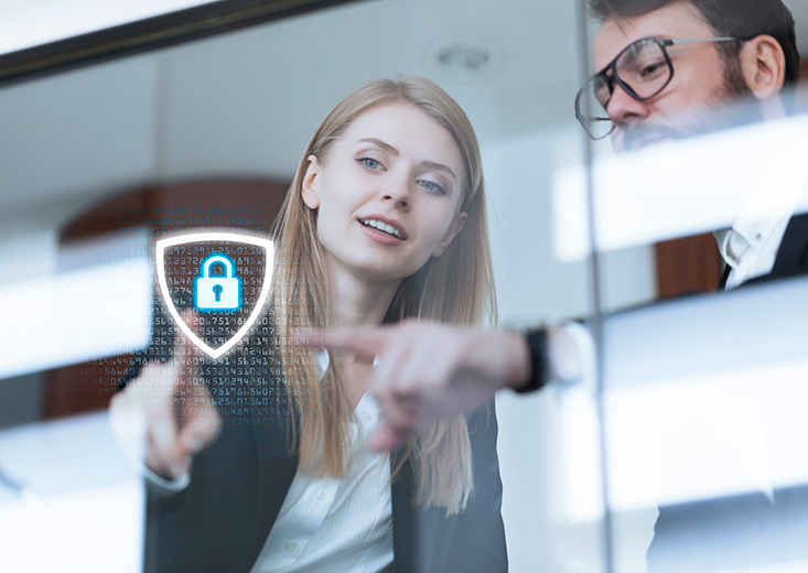 woman pointing at lock graphic on screen