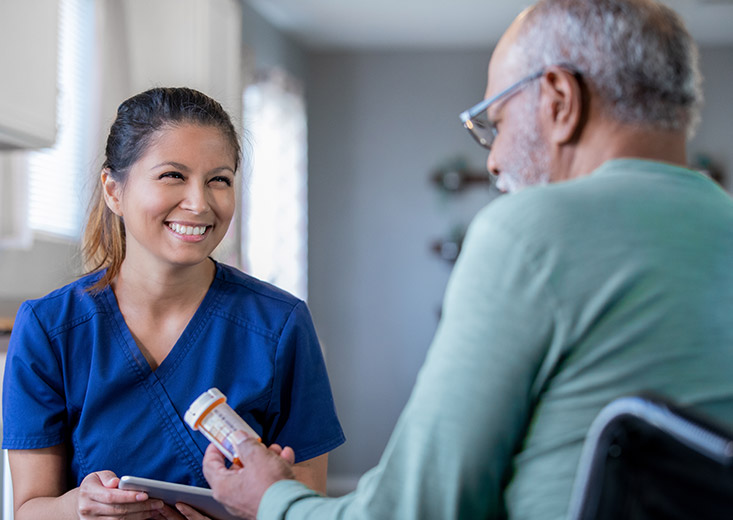 patient showing nurse empty bottle of medication